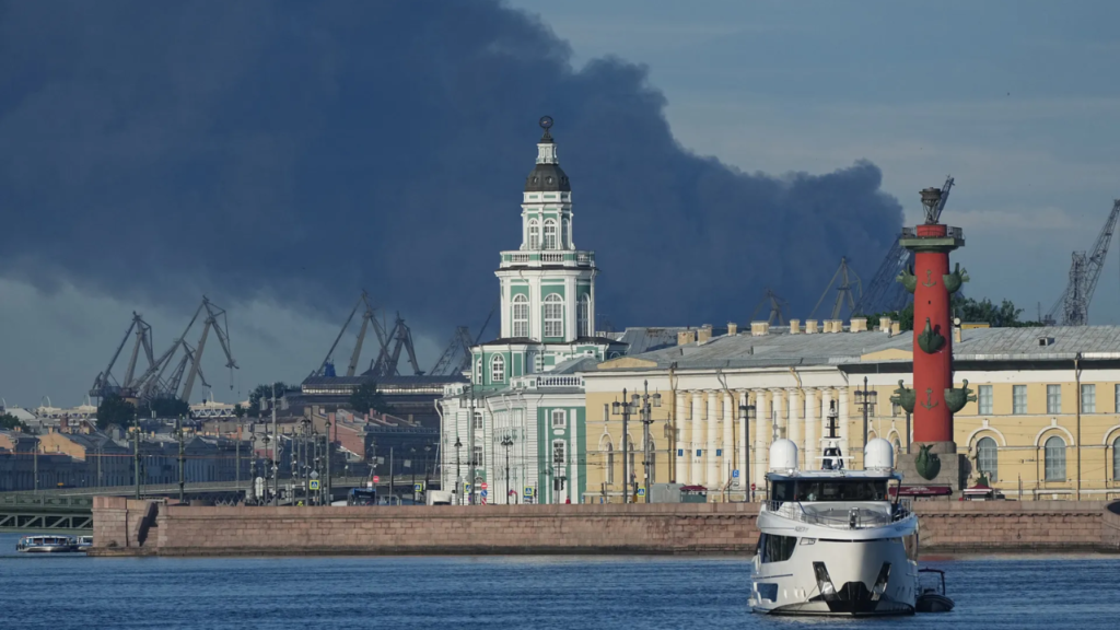 Smoke rising near the St. Petersburg oil terminal attack site in the city port