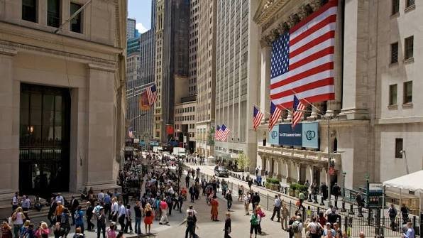 Wall Street is hitting record highs as the S&P 500 and Nasdaq continue to surge, but consumer confidence has fallen to its lowest level in more than a decade, highlighting a growing divide between soaring financial markets, household finances and the real economy.